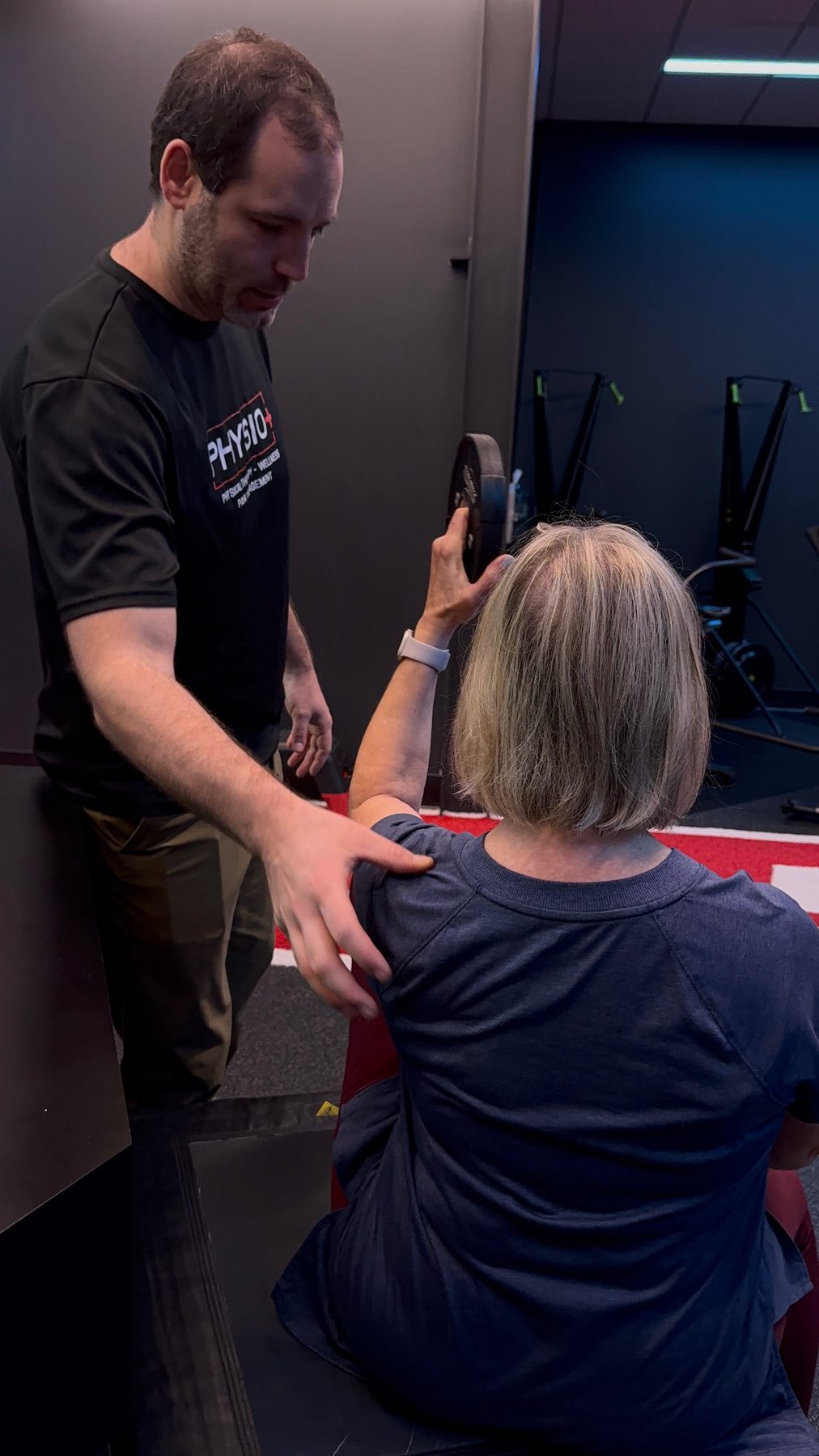 Shoulder range of motion assessment on an older patient at Physio+
